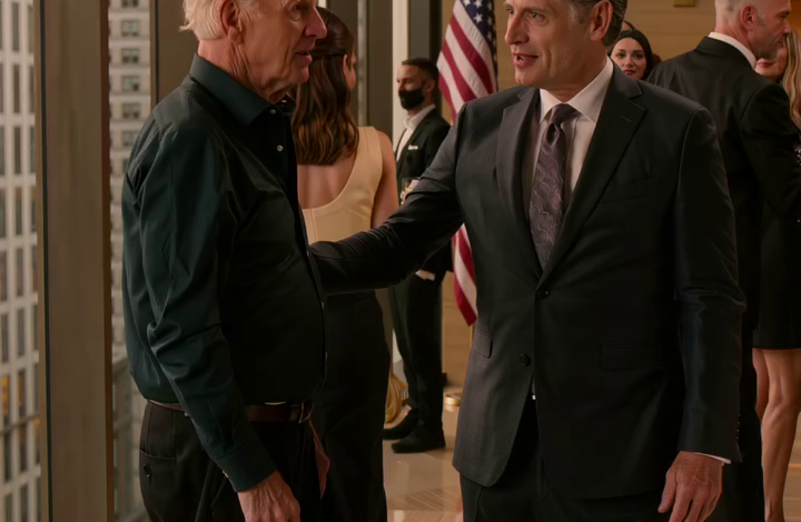 At my son’s first wedding anniversary party at a private club in downtown Atlanta, his father-in-law grabbed my elbow, steered me toward the service tables, and said under his breath, “Old man, go sit over there.” I didn’t argue a word—until a man at the far end of the room suddenly stood up, looked straight at me, and the whole party started changing color.
